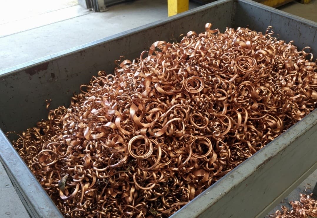 A bin of curly reddish copper machining turnings